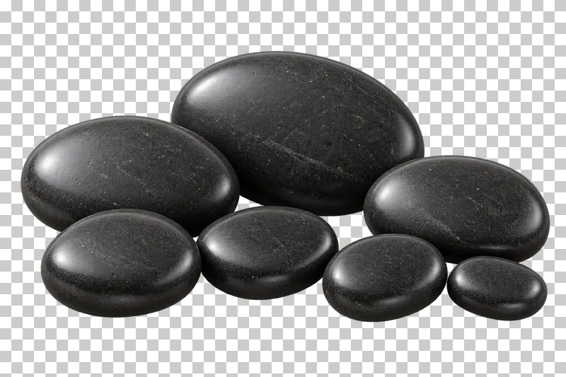 Seven smooth dark basalt massage stones in graduated sizes.