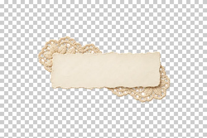Blank warm-white caption paper layered over two ivory lace snippets.