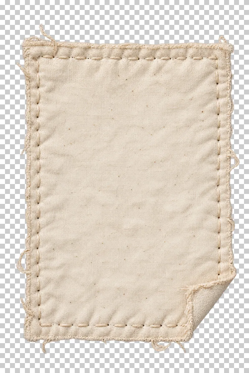 A blank quilted cotton photo backing with sparse cream seams and one turned corner.