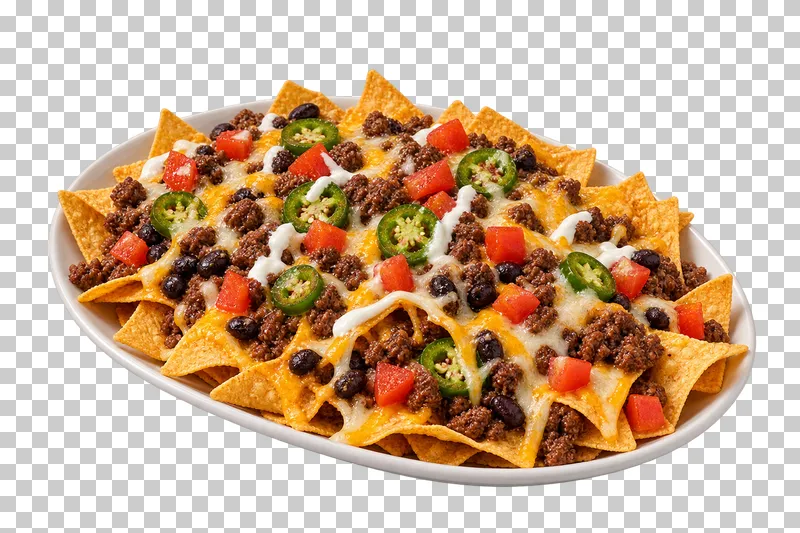 White platter of beef nachos with chips, beans, melted cheese, tomato and jalapeno.