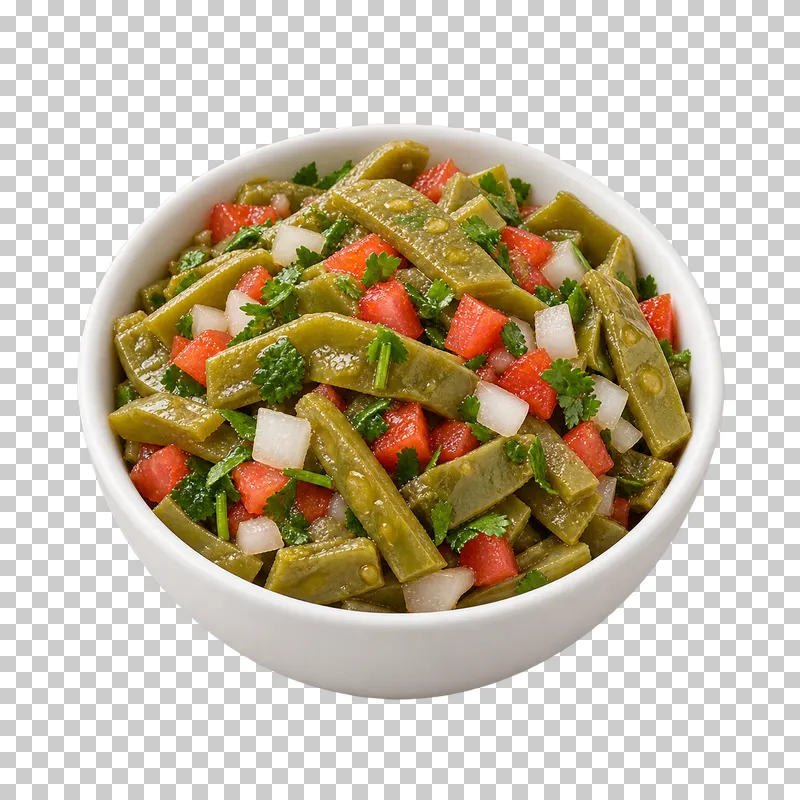 Small white bowl of nopales cactus strips, tomato, white onion and cilantro.