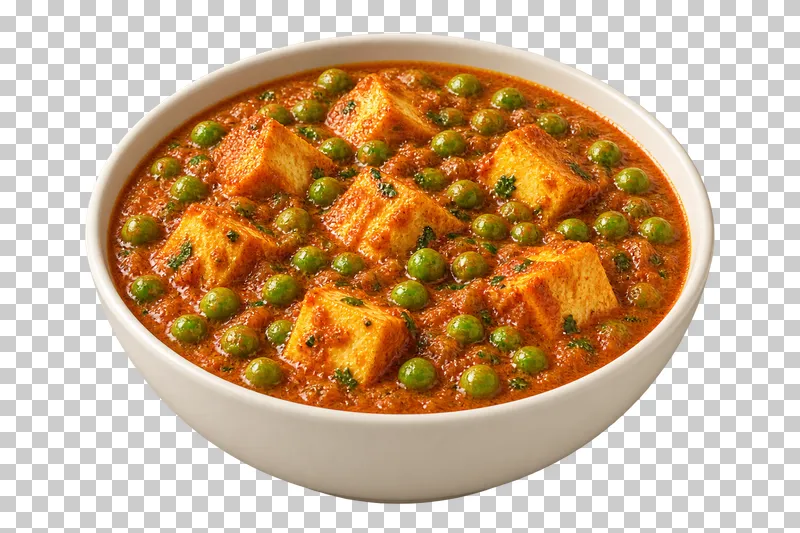 Paneer cubes and plentiful whole green peas in a thick tomato-onion gravy, in a shallow ivory bowl.
