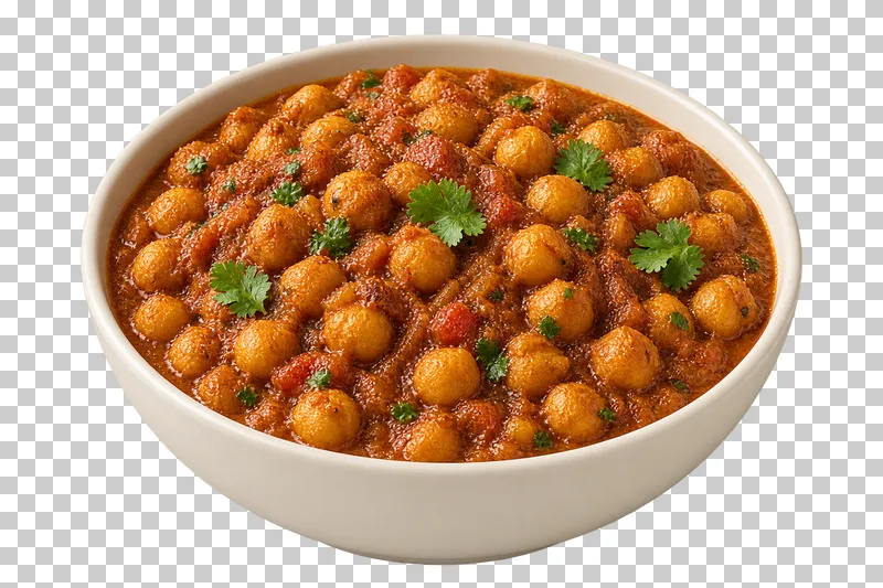 Whole cooked chickpeas densely coated in reduced onion-tomato masala, with a few attached coriander leaves, in a shallow ivory bowl