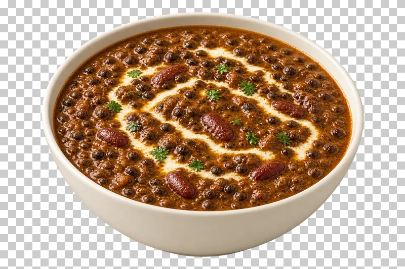 Dense dark whole black urad lentils with a small number of kidney beans and a restrained cream trail, in a shallow ivory bowl.