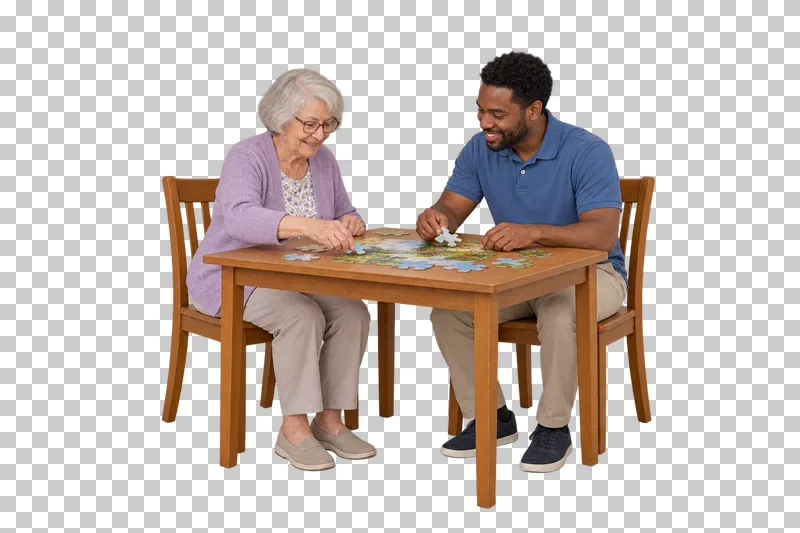 An older woman and a male companion place large jigsaw pieces at a compact table.