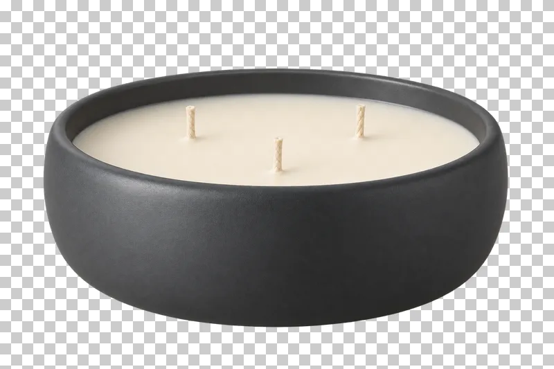 Unbranded three-wick bowl candle, isolated with a transparent background.