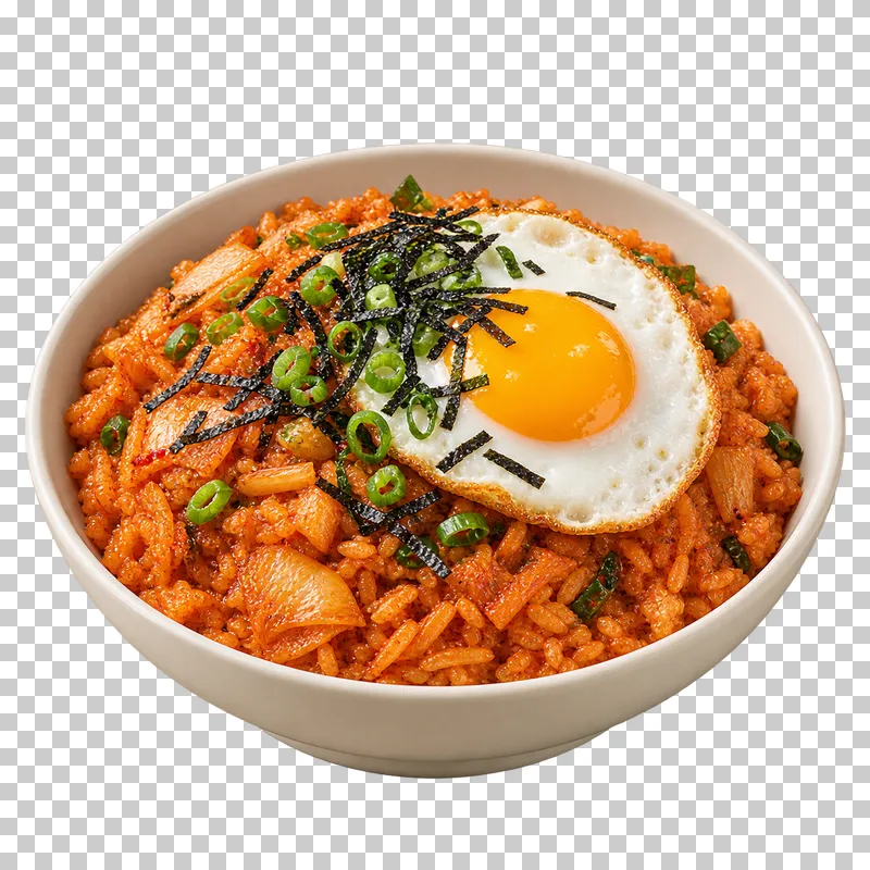 Red-orange kimchi fried rice with one fried egg, scallion and seaweed in an ivory bowl.