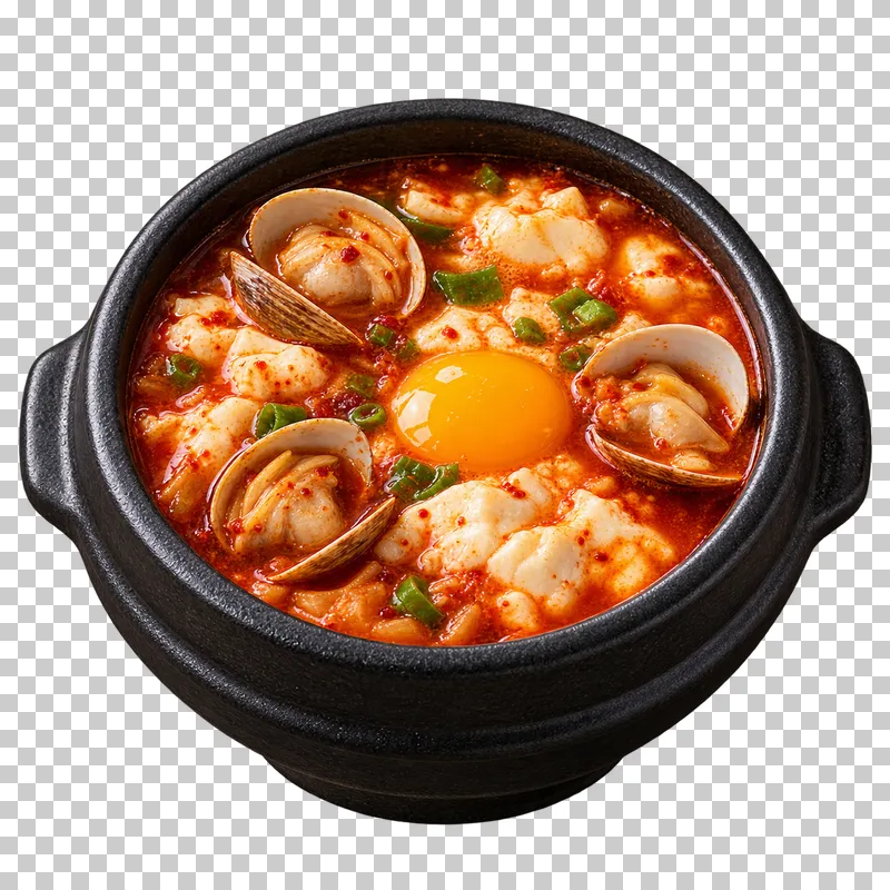 Sundubu-jjigae with irregular soft tofu curds, open clams and one egg in red broth in a black earthenware pot.