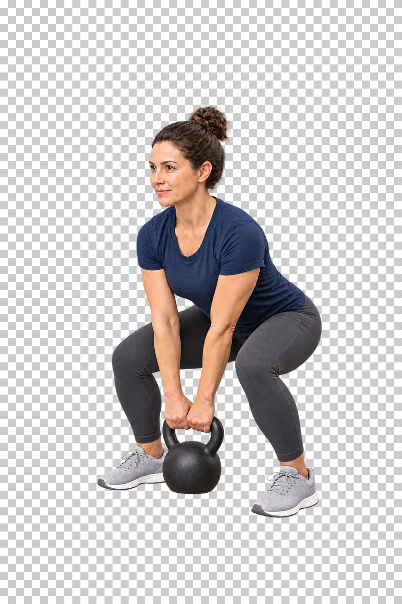 A woman lifting one black kettlebell between her feet with both hands.