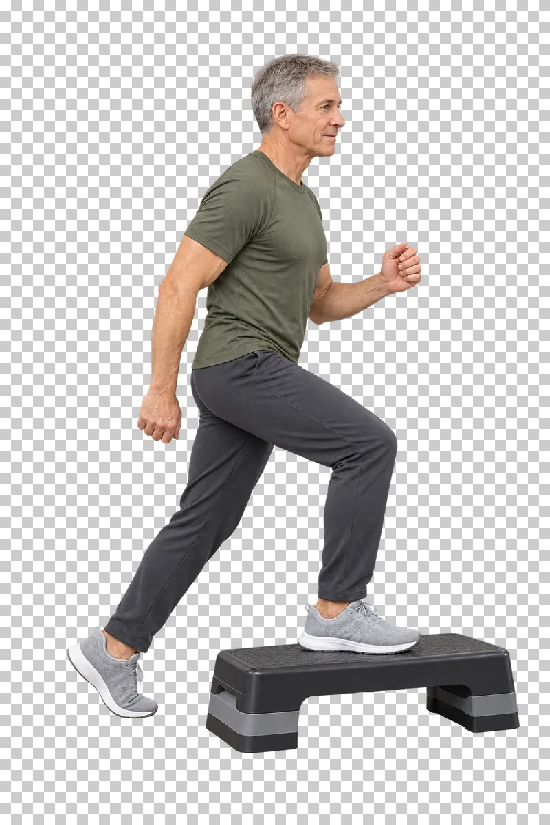 A gray-haired man stepping onto a low aerobic platform.