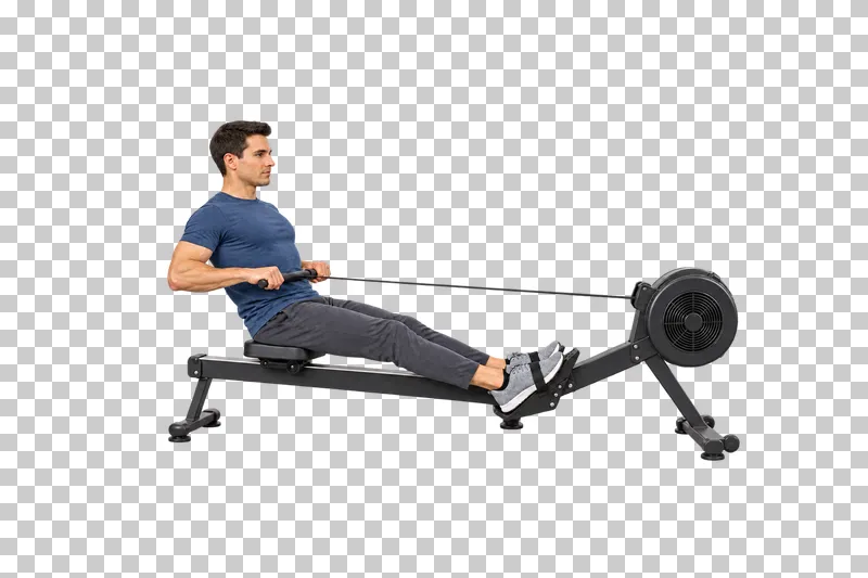 A man pulling the handle of a complete rowing ergometer with feet strapped to the footplates.