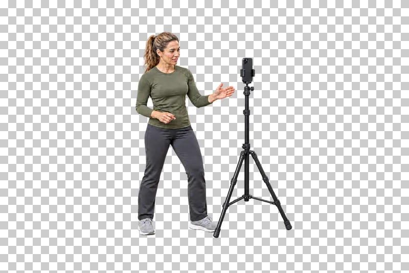 A female fitness coach explaining toward a portrait phone clamped to a complete tripod.